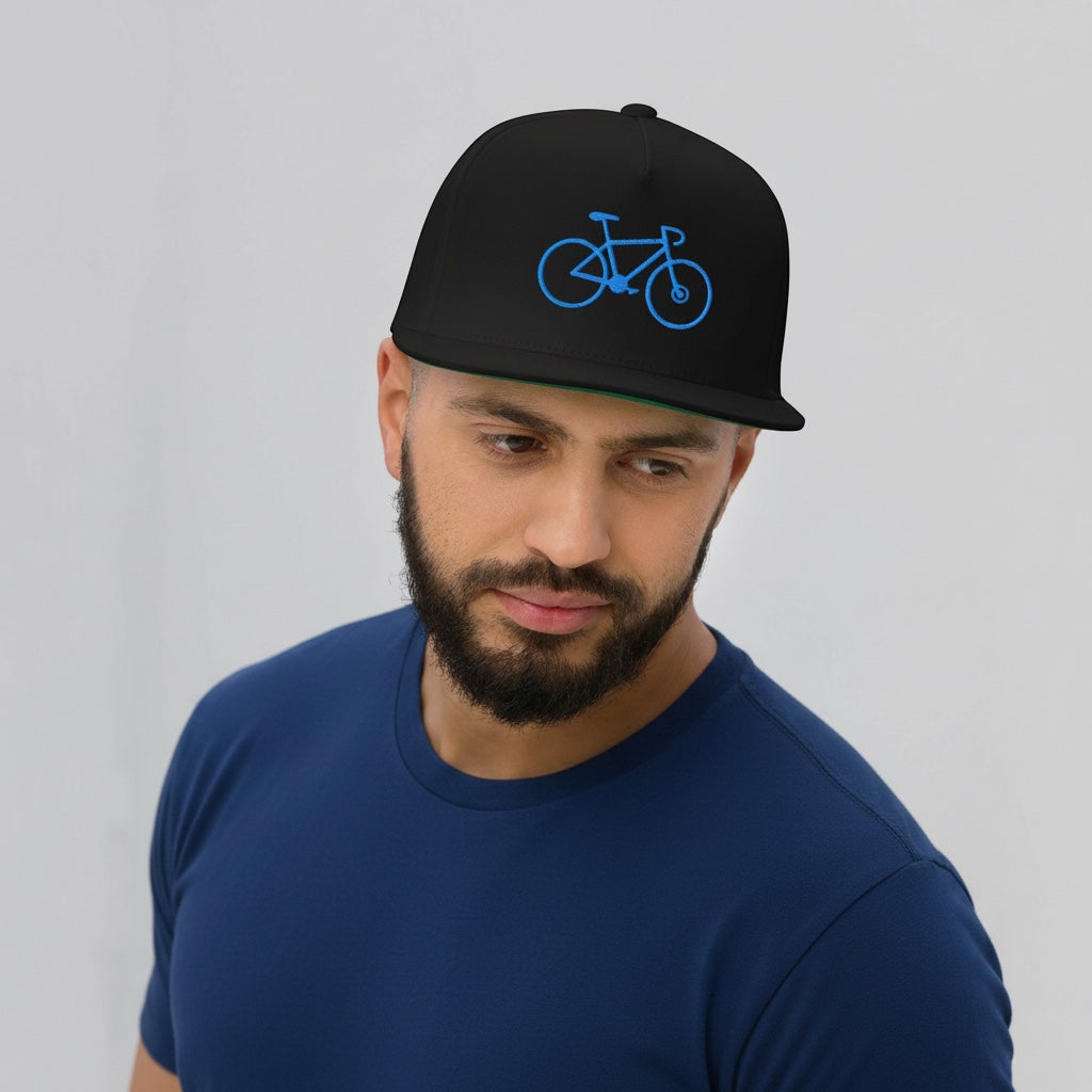 Bikes Make Me Happy high-profile black flat bill cap with blue embroidered bike on a bearded man