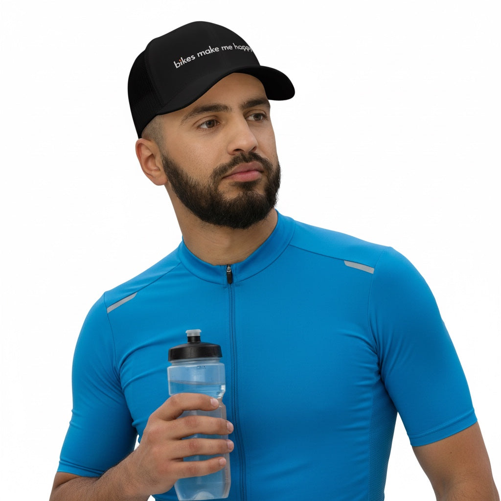 Bikes Make Me Happy classic black mid-profile hat with mesh back worn by a cyclist in a blue jersey holding a bottle