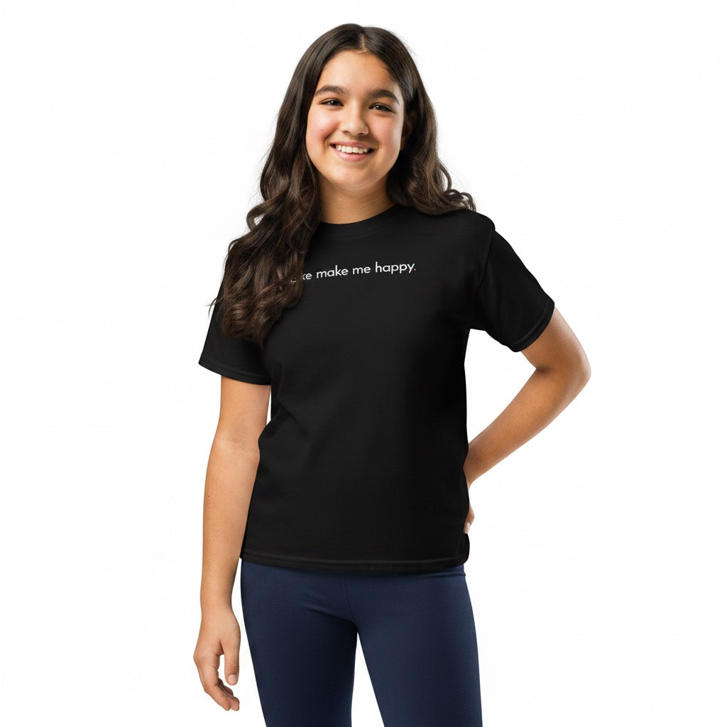 A smiling girl wearing a black Bikes Make Me Happy cotton t-shirt with white text on a white background.