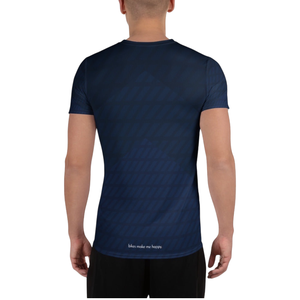 Back view of a man wearing a Bikes Make Me Happy navy blue performance riding shirt with a subtle chevron pattern.