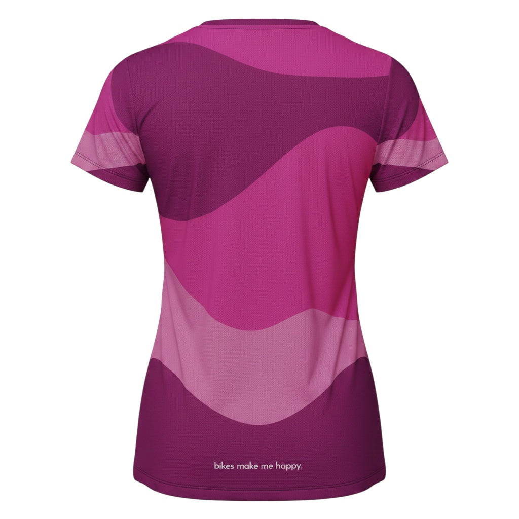 Back view of Bikes Make Me Happy women's pink camo performance riding shirt with breathable mesh fabric.