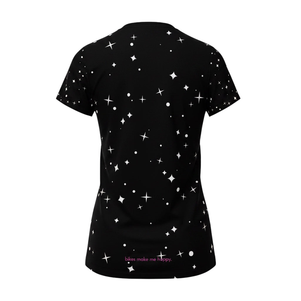 Back view of Bikes Make Me Happy women's black performance riding shirt with white star pattern and mesh fabric.