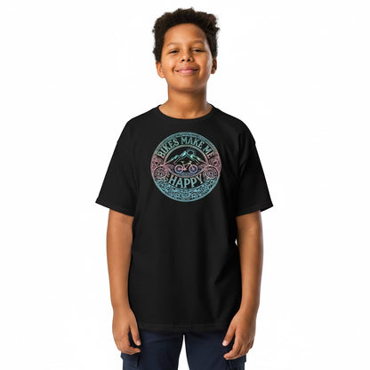 A young boy wearing a black Bikes Make Me Happy cotton t-shirt with a circular etched bike graphic in blue and pink.