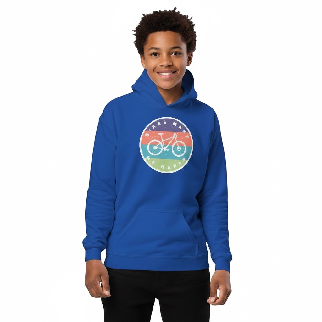 A smiling youth wearing a blue Bikes Make Me Happy hoodie with a circular graphic badge on the chest.