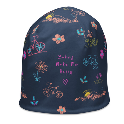blue beanie with pastel graphics of bicycles, flowers, sunrise over mountains and bikes make me happy text with a heart