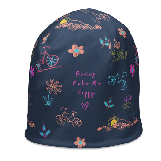 blue beanie with pastel graphics of bicycles, flowers, sunrise over mountains and bikes make me happy text with a heart